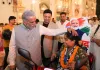 Faridabad News: सेवा संकल्प अभियान के शुभारंभ अवसर पर 200 दिव्यांगजनों को वितरित किए निःशुल्क ई-स्कूटर
