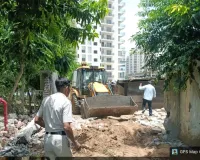 Gurugram/Manesar News: मानेसर में निगम ने ध्वस्त किया रास्ते पर अवैध कब्जा 